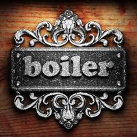 boiler word of iron on wooden background photo