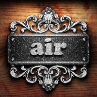 air word of iron on wooden background photo