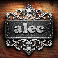 alec word of iron on wooden background photo