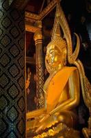 Ancient buddha statue in wat Thai or Thai temple. Giant Buddha god worship, Asian architecture art landmark, famous shrine for tourism. History spiritual temple of god. Travel Thailand attraction. photo