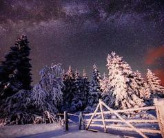 Winter landscape. Mountain village in the Ukrainian Carpathians. photo