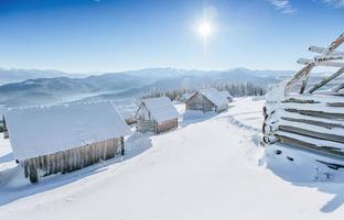 Mysterious winter landscape majestic mountains in winter. Magical winter snow covered tree. Winter road in the mountains. In anticipation of the holiday. Dramatic wintry scene. Carpathian. Ukraine photo