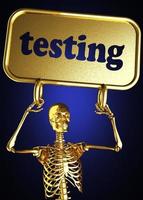 testing word and golden skeleton photo