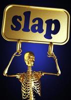 slap word and golden skeleton photo