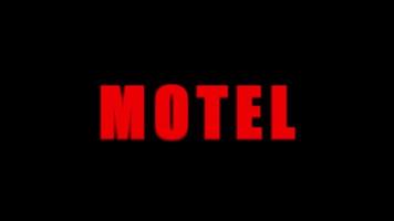 Video Motel Text Neonrot auf schwarzem Hintergrund