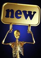nueva palabra y esqueleto dorado foto