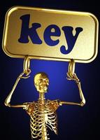 palabra clave y esqueleto dorado foto