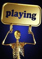 playing word and golden skeleton photo