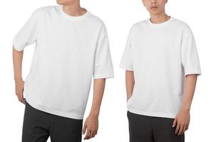 Young man in blank oversize t-shirt mockup front and back used as design template, isolated on white background with clipping path photo