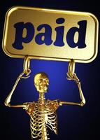 paid word and golden skeleton photo