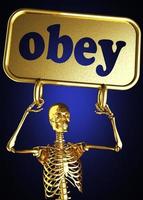 obey word and golden skeleton photo