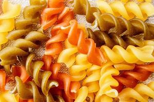 Italian uncooked Fusilli raw pasta. Horizontal image. photo