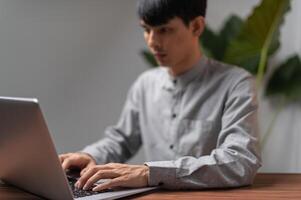 People are using computers, notebooks to communicate, work, play games, watch movies, listen to music. photo