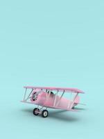 Toy vintage aircraft. Illustration with empty place for text. Vertical orientation. 3D rendering photo