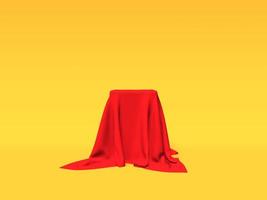 podio, pedestal o plataforma cubierta con tela roja sobre fondo amarillo. ilustración abstracta de formas geométricas simples. representación 3d foto