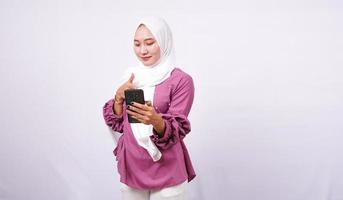 beautiful women hijab holding phone isolated white background photo