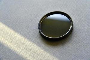 Light filter for a photo lens on a gray background