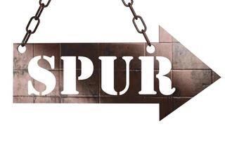 spur word on metal pointer photo