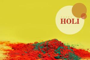 Indian festival Holi concept Multi color's bowl with colorful background and writing happy holi photo