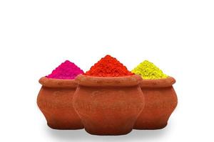 Indian festival Holi concept Multi color's bowl with colorful background. photo
