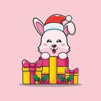 Cute bunny with christmas gift. Cute christmas cartoon illustration. vector