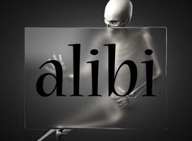 alibi word on glass and skeleton photo