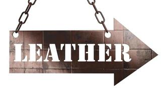 leather word on metal pointer photo