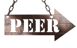 peer word on metal pointer photo