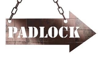 padlock word on metal pointer photo