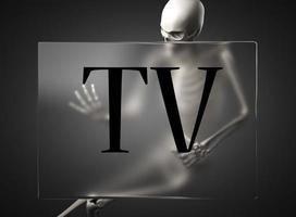 TV word on glass and skeleton photo