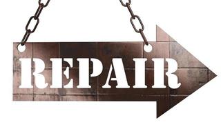 repair word on metal pointer photo