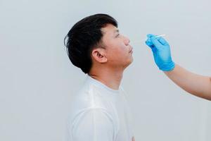 Nurses are using the Male Initial Virus Test Kit, the Antigen Test Kit, or ATK, as a test kit for COVID-19. photo