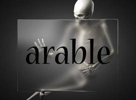 arable word on glass and skeleton photo