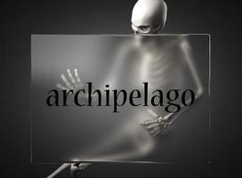 archipelago word on glass and skeleton photo