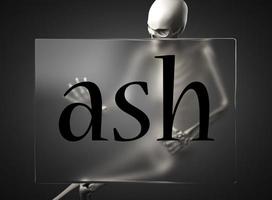 ash word on glass and skeleton photo