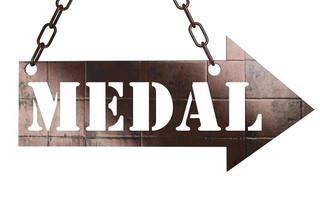 medal word on metal pointer photo