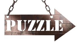 puzzle word on metal pointer photo