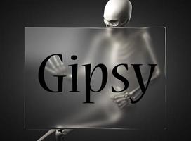 Gipsy word on glass and skeleton photo