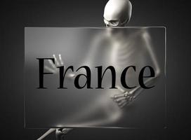 Francia palabra sobre vidrio y esqueleto foto