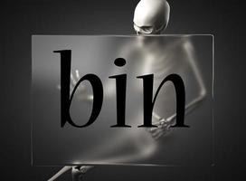 bin word on glass and skeleton photo