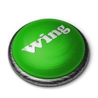 wing word on green button isolated on white photo