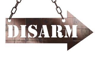 disarm word on metal pointer photo