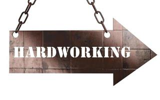 hardworking word on metal pointer photo