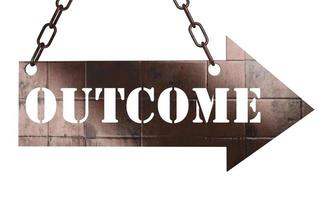 outcome word on metal pointer photo