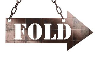 fold word on metal pointer photo