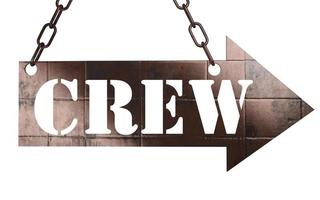 crew word on metal pointer photo