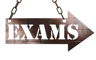 exams word on metal pointer photo