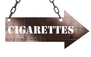 cigarettes word on metal pointer photo