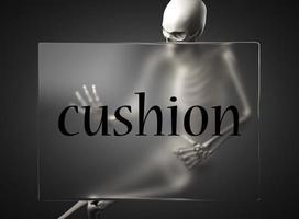 cushion word on glass and skeleton photo
