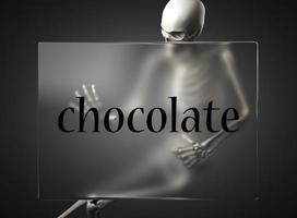 chocolate word on glass and skeleton photo